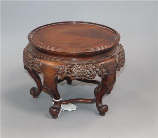 A Chinese carved hardwood vase stand height 15.5cm